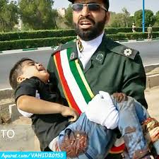 مراسم تشییع پیکر پاک شهید حادثه تروریستی اهواز  کودک خردسال محمدطاها اقدامی در شهر وزوان