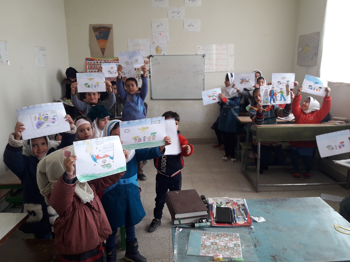 برگزاری مسابقه نقاشی بین دانش آموزان مدرسه ابتدایی روستای پاوان