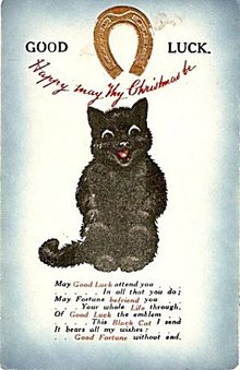 نمونه ای از کارت تبریک با علامت نعل و گربه سیاه که نشان خوش اقبالی هستند