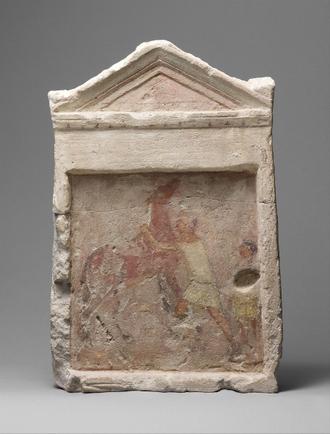 یک سنگ قبر با نقاشی مردی به همراه اسبش